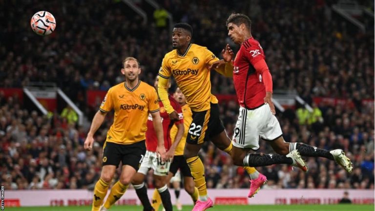 Manchester United open season with slim win over Wolves